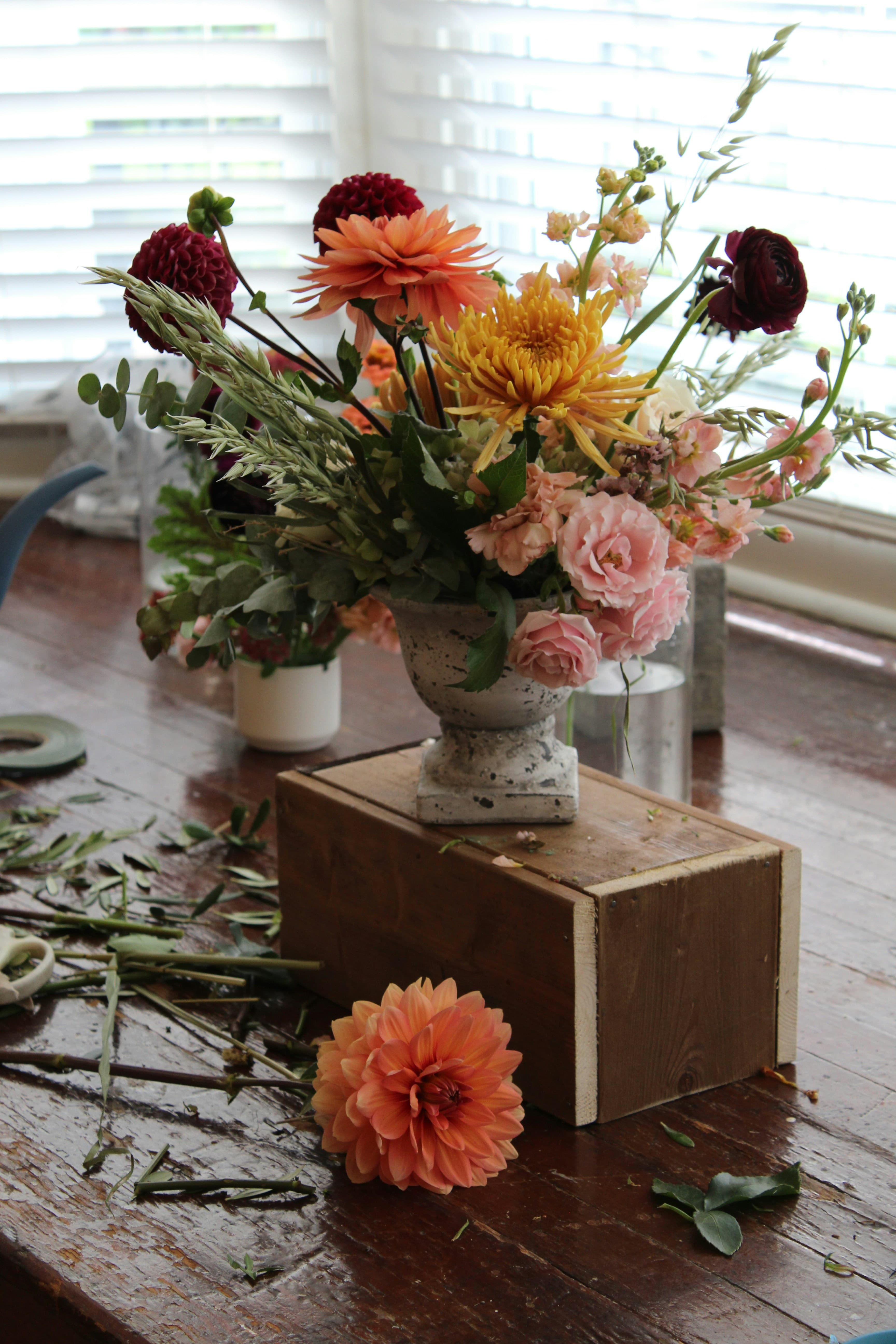 Rustic studio arrangement with dahlias