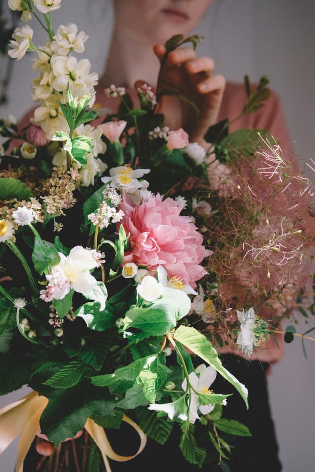 Florist holding a bouquet